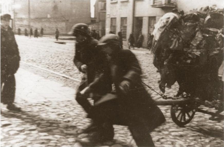 Ghetto workers delivering textile scraps